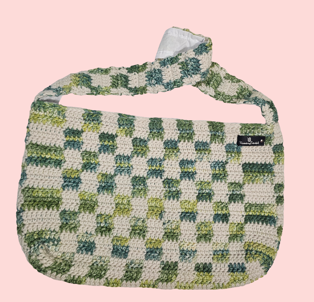 Green and white checkered bag
